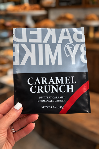 Custom printed Mylar cookie packaging for Baked by Mike “Caramel Crunch” cookies, a resealable stand-up pouch designed for bakery products with barrier protection to keep cookies fresh.