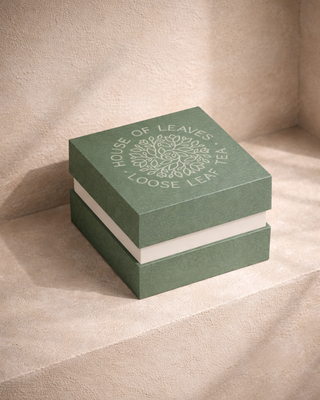 Custom rigid two-piece box packaging for House of Leaves loose leaf tea premium luxury tea packaging design and high-end editorial product.