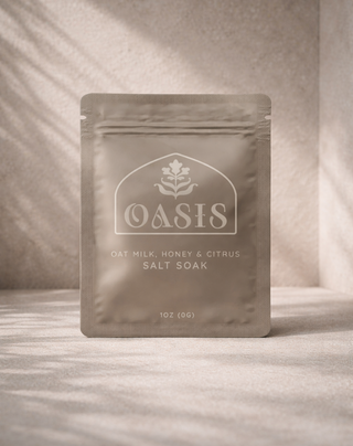 Custom printed flat mylar pouch for Oasis oat milk, honey & citrus salt soak bath product, featuring resealable spa packaging highlighting premium cosmetic and wellness packaging design.