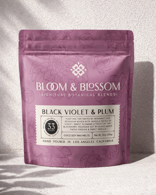 Custom printed stand-up pouch packaging for Bloom & Blossom Black Violet & Plum coco soy wax melts, featuring botanical patterned mylar bag design and premium product label for candle and wax melt packaging.